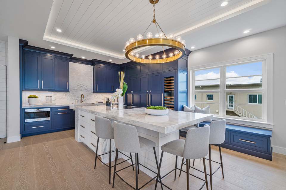 Amity door style in painted Maple wood Indigo - 20 Matte color White island by Clearview Cabinetry