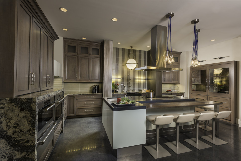 Richmond door style in select Cherry wood with Bedrock with Accent finish by Creative Kitchen and Bath