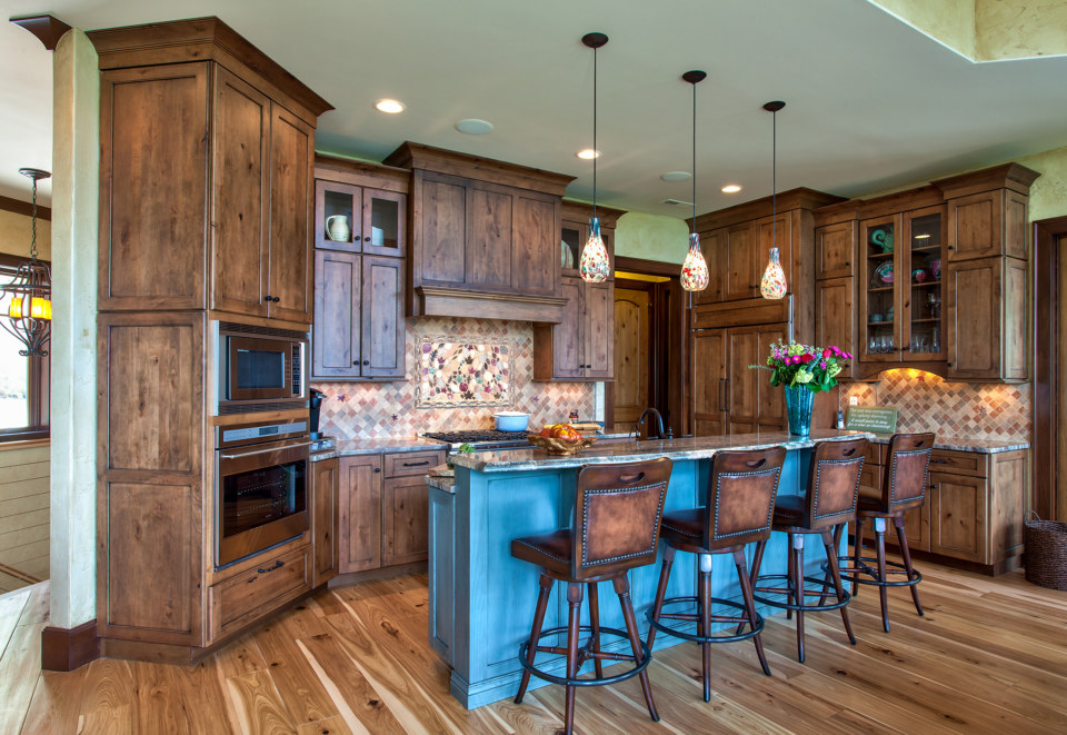 Stockton door style in Knotty Alder wood with Custom Stain by Advance Cabinetry